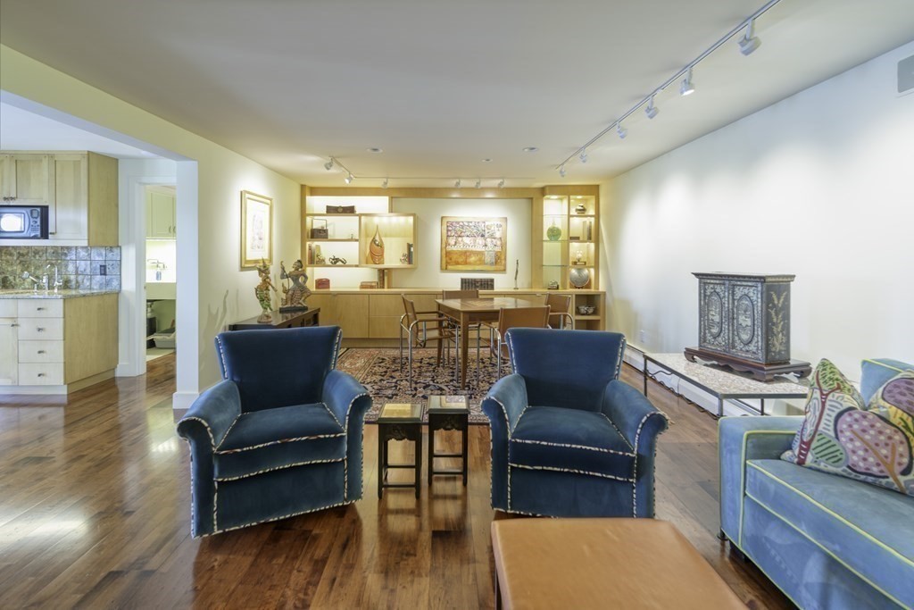 37 Beverly Road Arlington, MA 02474 - Photo 33 of 42 a living room with furniture and a wooden floor