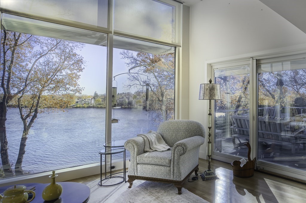 37 Beverly Road Arlington, MA 02474 - Photo 9 of 42 a living room with furniture and a large window
