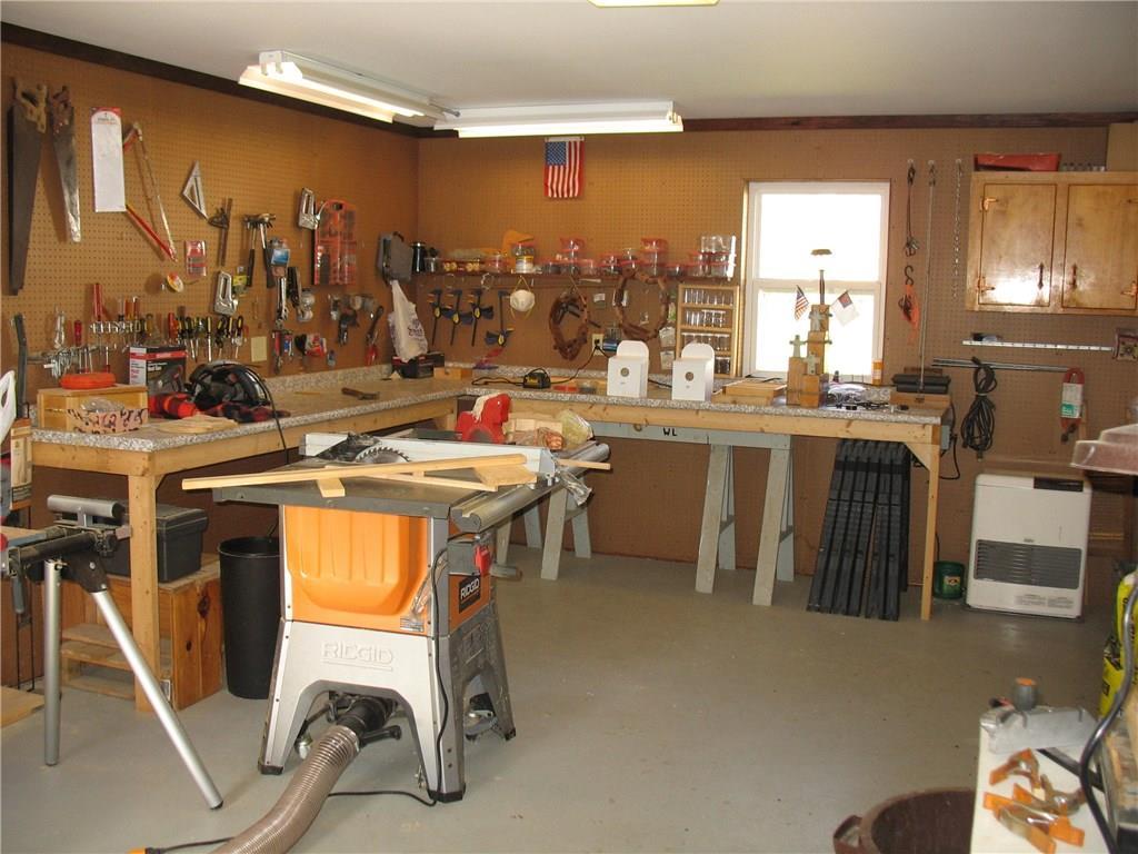 27 Albert Street Milo, ME 04463 - Photo 31 of 31 Workshop in rear of garage, heated.