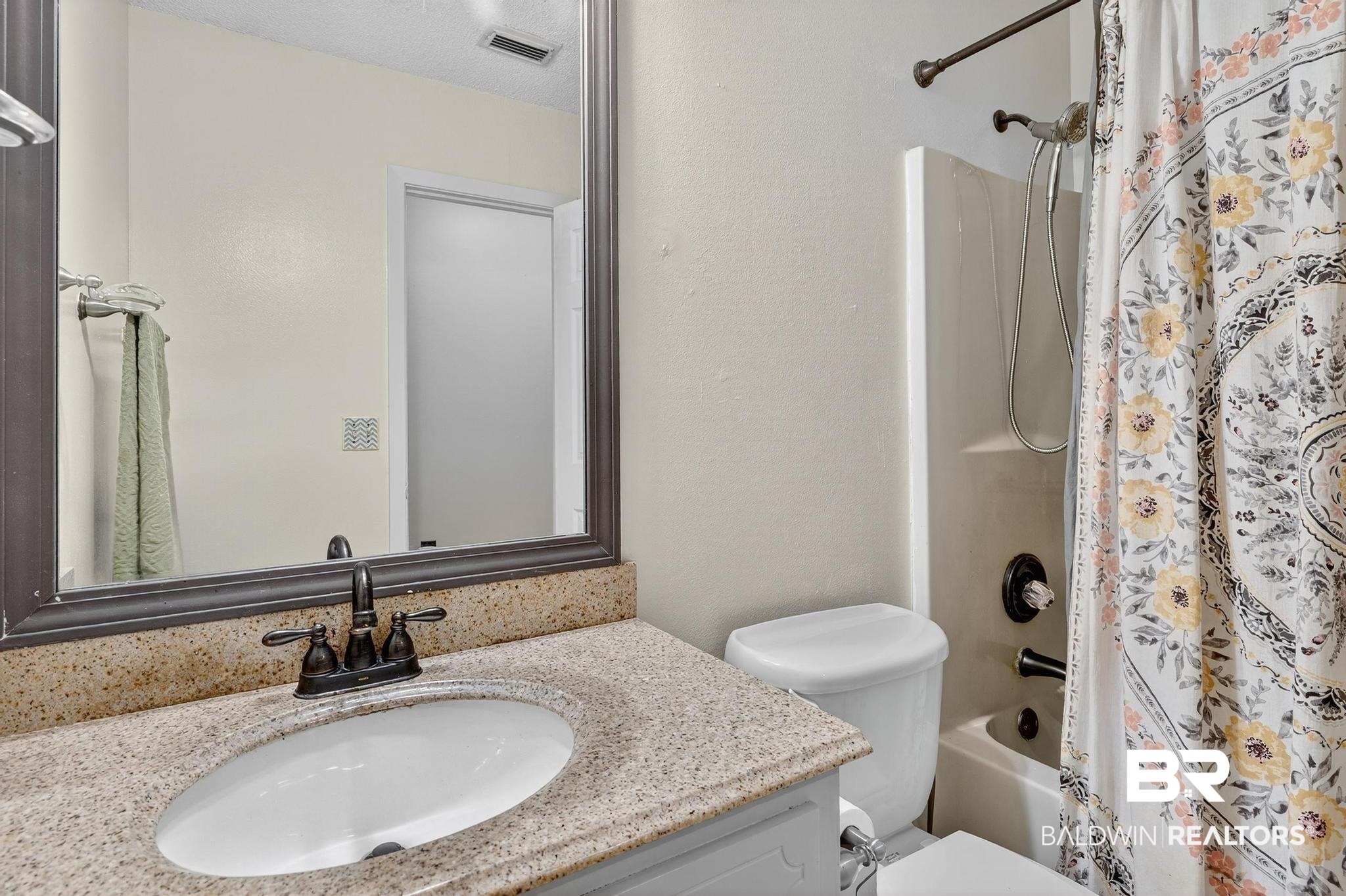 21895 2nd Street Silverhill, AL 36576 - Photo 38 of 43 Bathroom featuring shower / bathtub combination and vanity