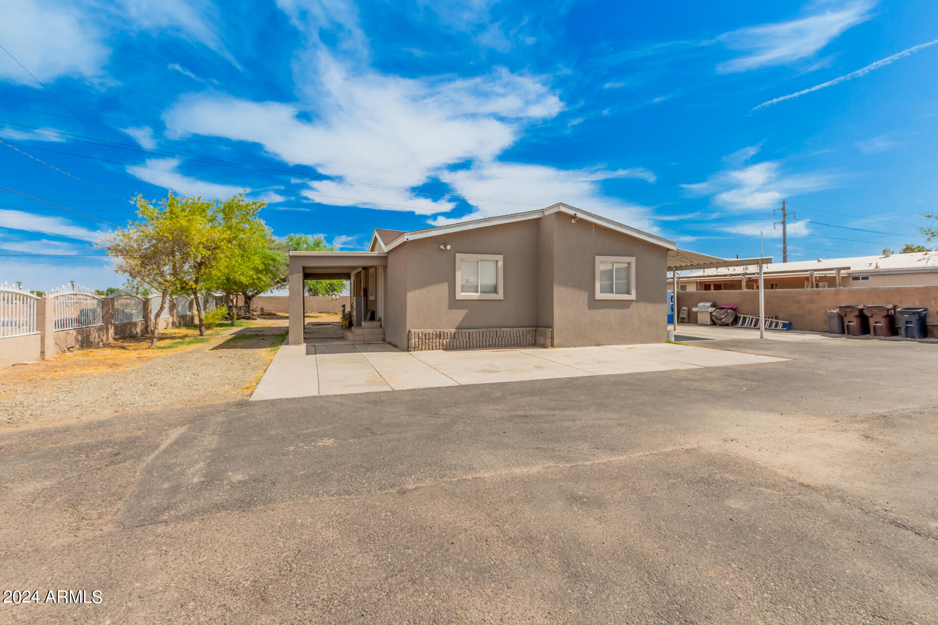 7015 West Lower Buckeye Road Phoenix, AZ 85043 - Photo 1 of 28 0001-01 - Lower Buckeye 7015