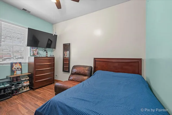 a bathroom with a toilet a sink and a mirror