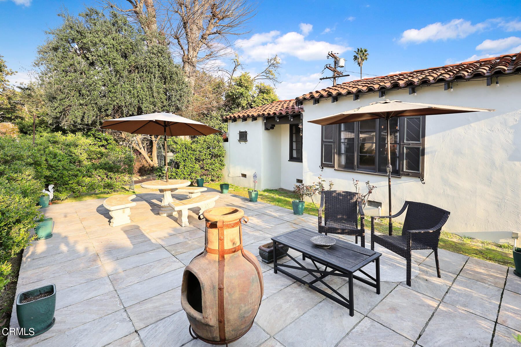 1400 Moncado Drive Glendale, CA 91207 - Photo 11 of 15 a patio table and chairs with the umbrella