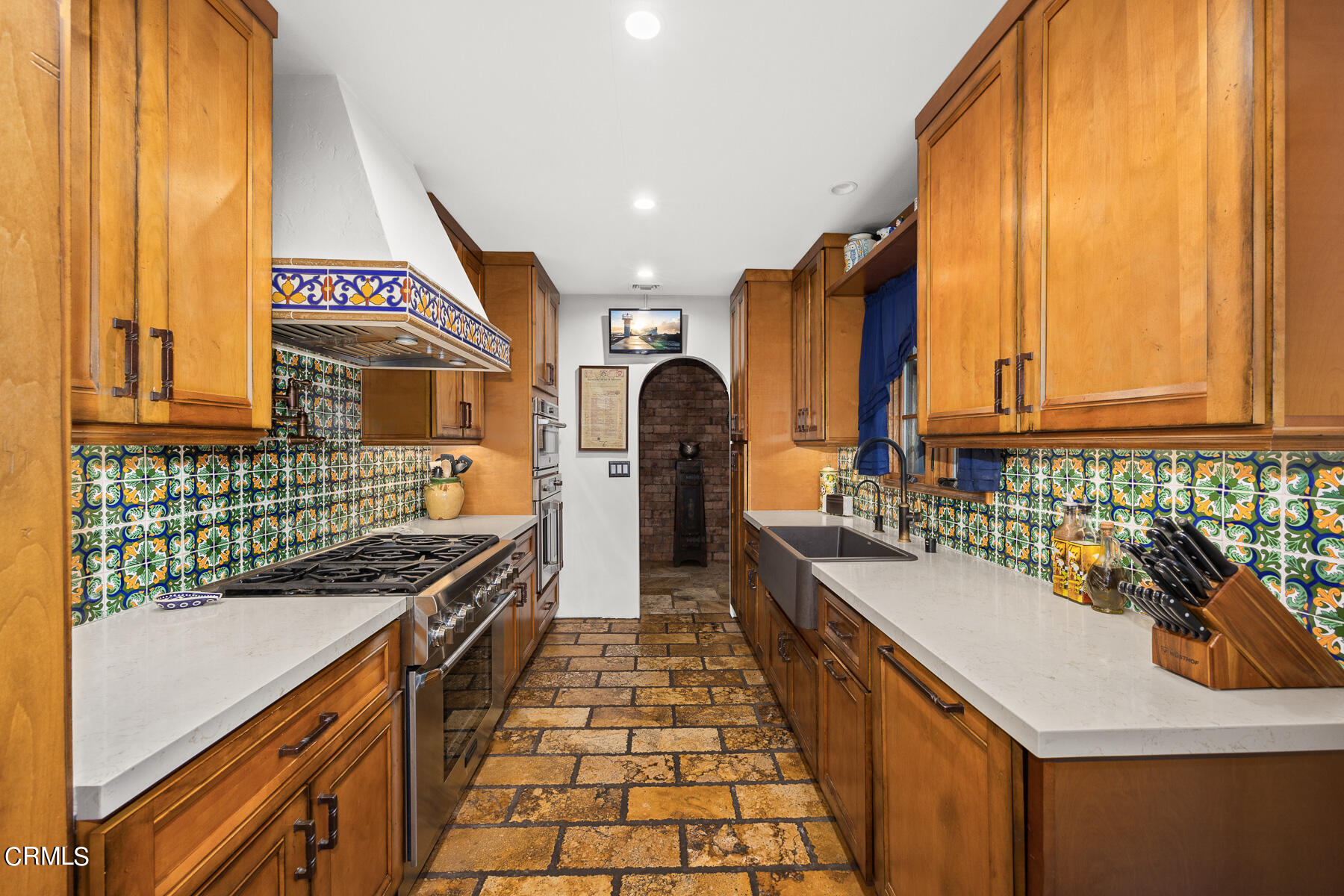 1400 Moncado Drive Glendale, CA 91207 - Photo 4 of 15 a kitchen with lots of counter top space and stainless steel appliances
