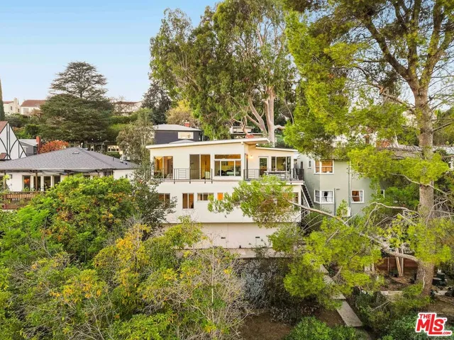 a house view with a garden space
