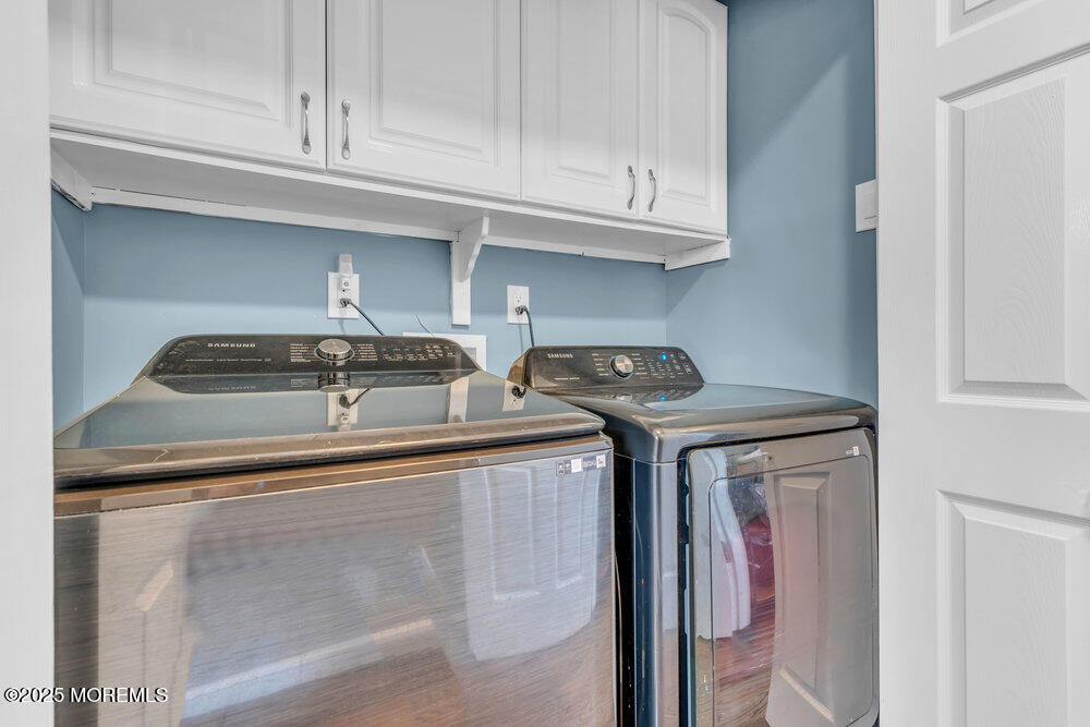 19 Gravelly Point Road Highlands, NJ 07732 - Photo 17 of 35 a utility room with dryer and cabinets