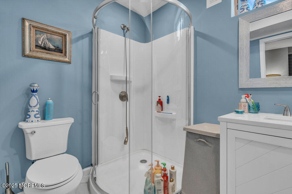 19 Gravelly Point Road Highlands, NJ 07732 - Photo 20 of 35 a white toilet sitting next to a bathroom sink