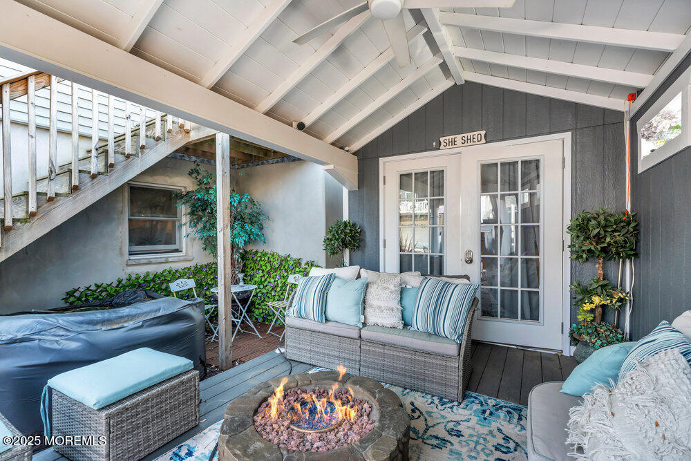 19 Gravelly Point Road Highlands, NJ 07732 - Photo 24 of 35 a balcony with furniture and wooden floor