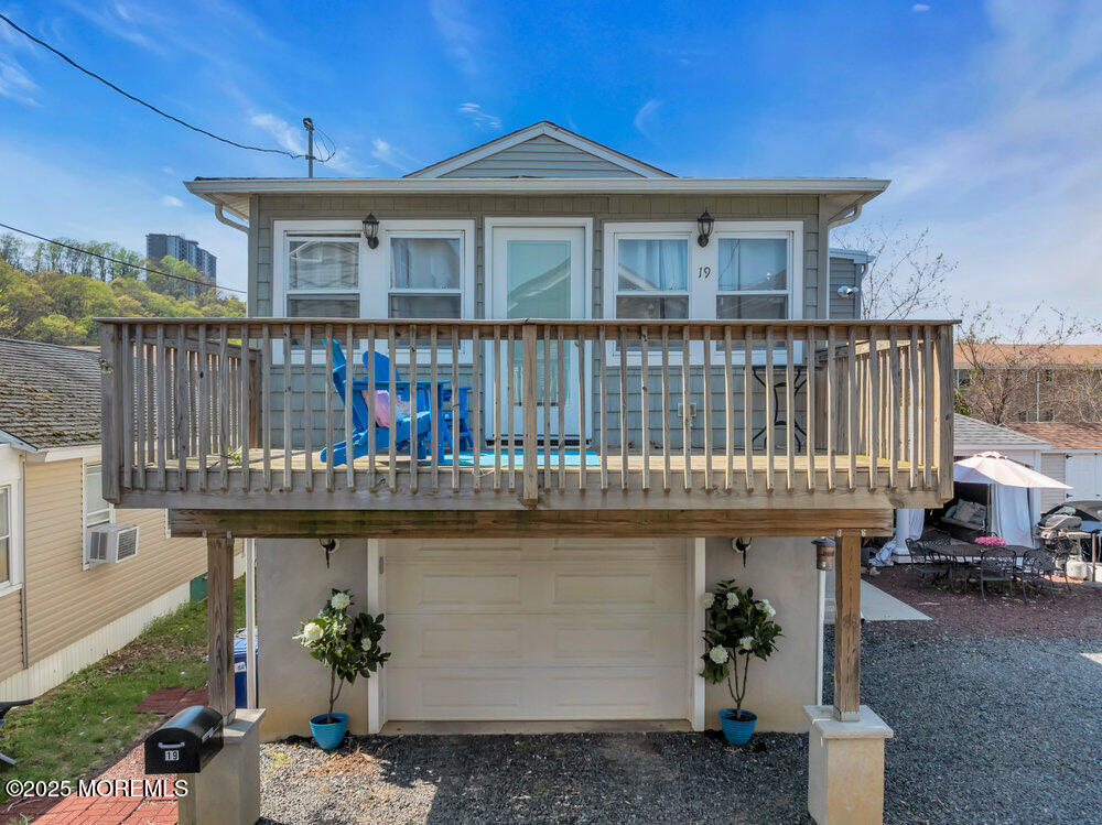 19 Gravelly Point Road Highlands, NJ 07732 - Photo 26 of 35 a front view of a house with balcony