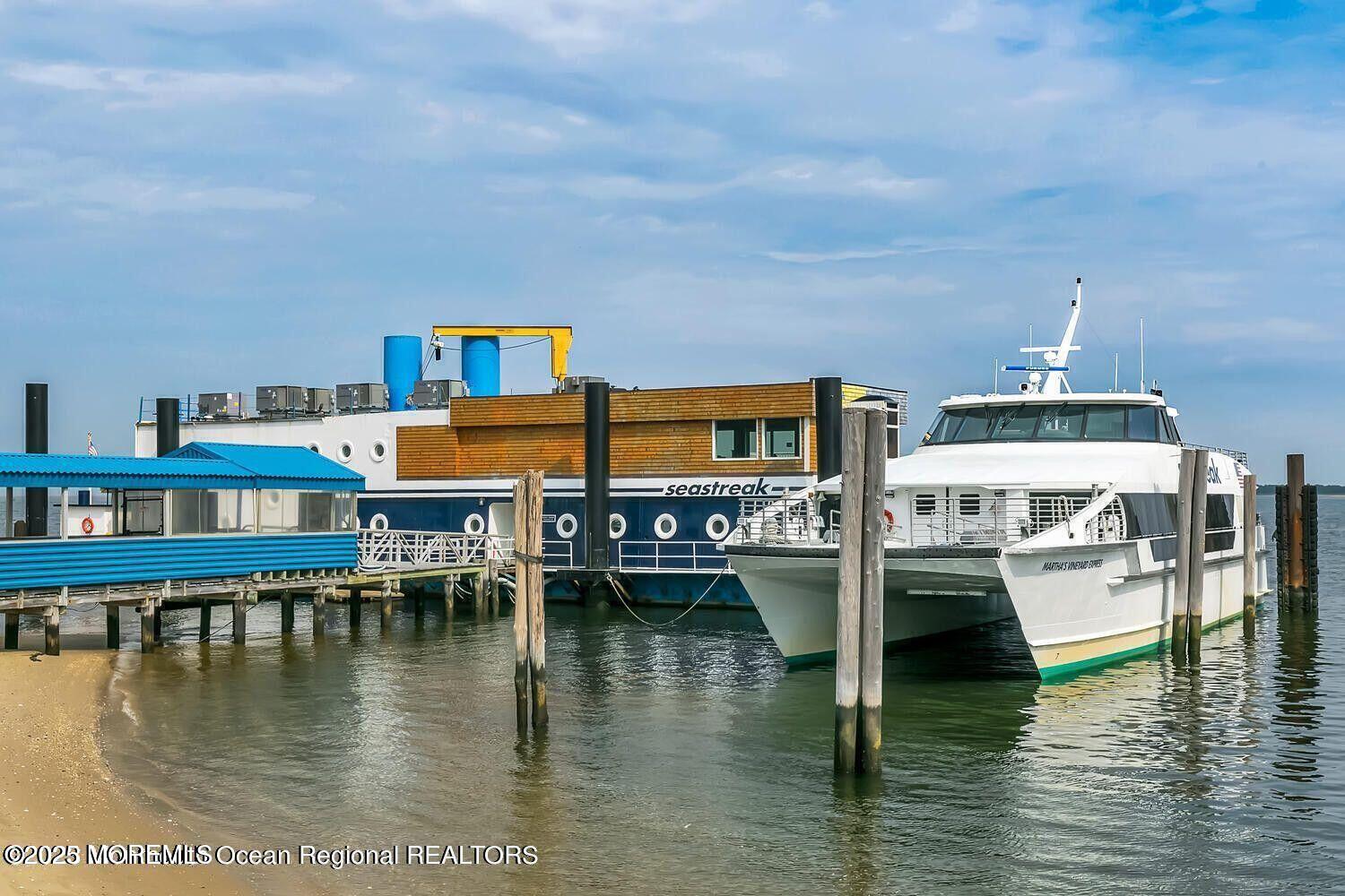 19 Gravelly Point Road Highlands, NJ 07732 - Photo 31 of 35 a swimming pool view with a lake view
