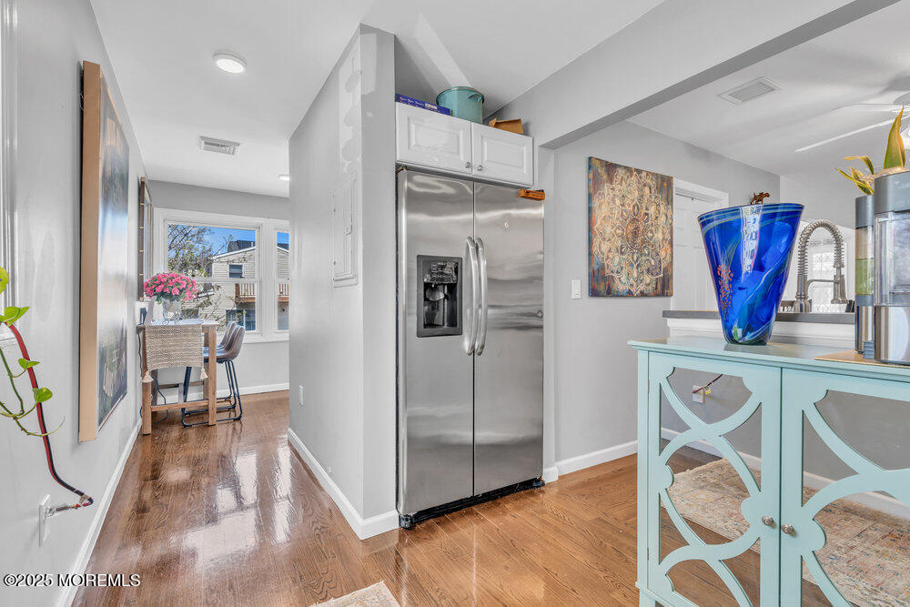 19 Gravelly Point Road Highlands, NJ 07732 - Photo 5 of 35 a view of kitchen with furniture and wooden floor