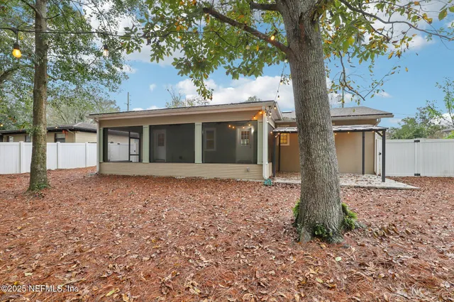 front view of a house with a trees