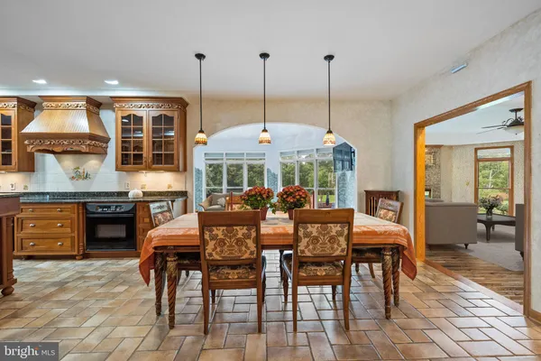 a view of a dining hall with furniture