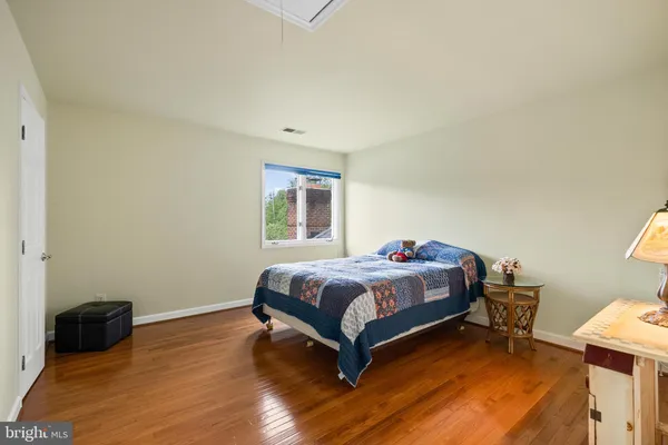a living room with fireplace furniture and a flat screen tv