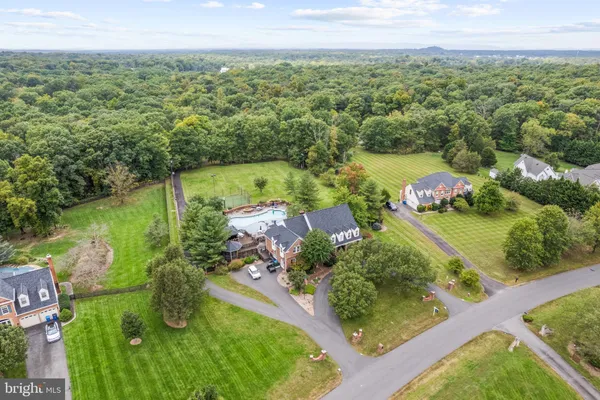 a view of a backyard with green space
