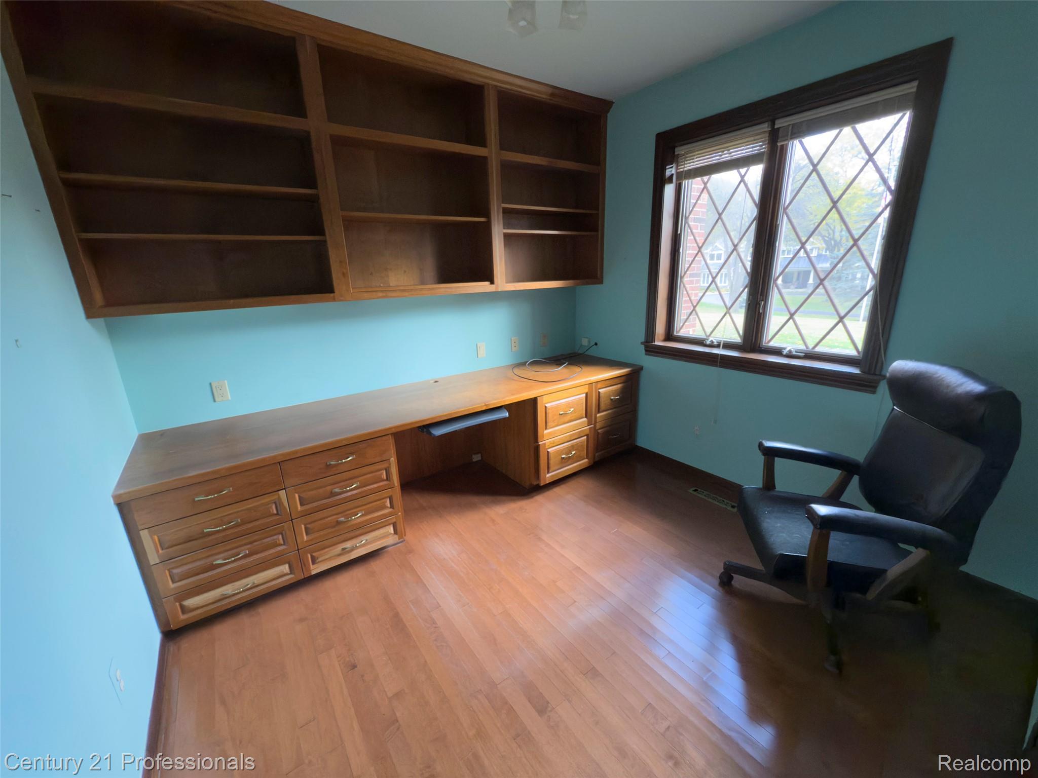 303 East Snell Road Rochester, MI 48306 - Photo 22 of 45 office featuring built in desk