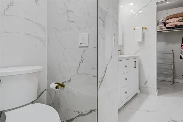 a kitchen with a sink and a refrigerator