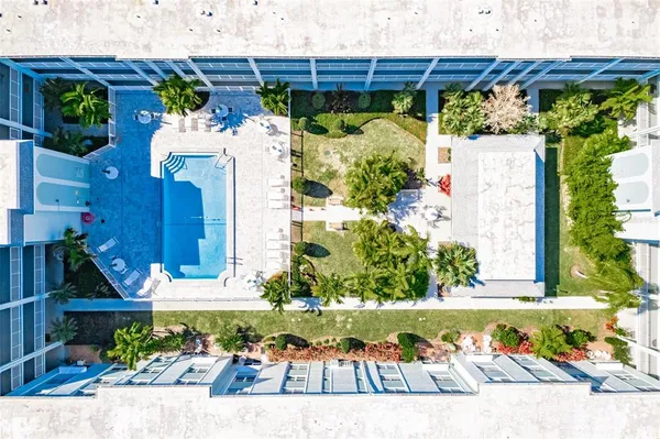 a kitchen with stainless steel appliances a cabinets and a refrigerator