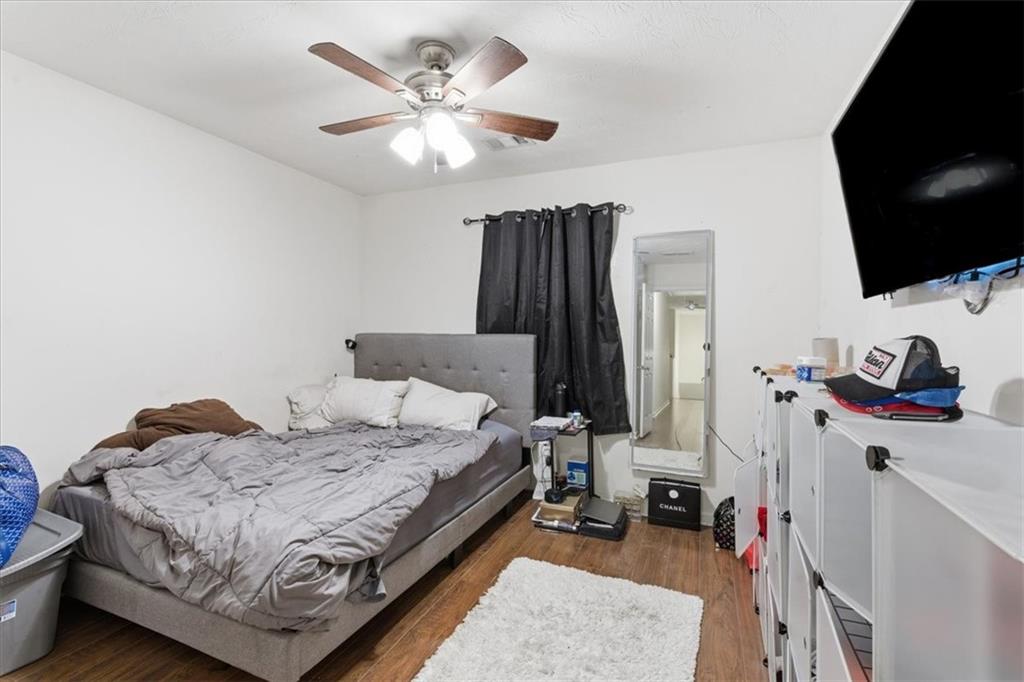 809 Winsap Drive Stockbridge, GA 30281 - Photo 25 of 41 a bed room with a bed and a flat screen tv