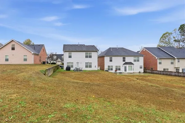 a house view with a garden space