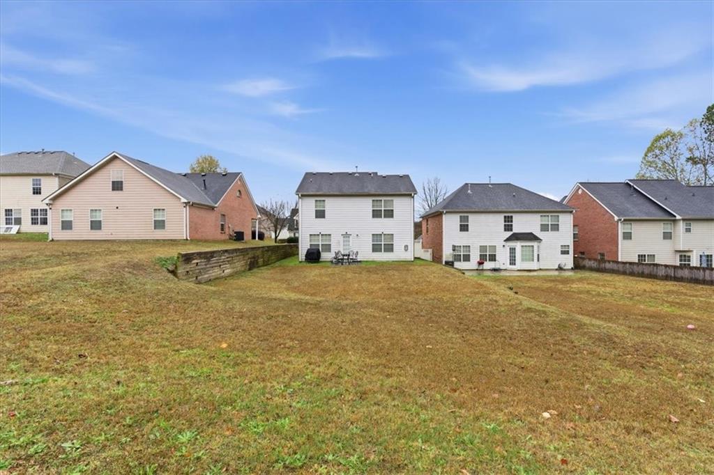 809 Winsap Drive Stockbridge, GA 30281 - Photo 36 of 41 a front view of house with yard and swimming pool