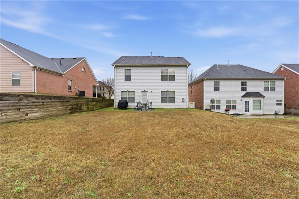 809 Winsap Drive Stockbridge, GA 30281 - Photo 38 of 41 a view of a house with a outdoor space