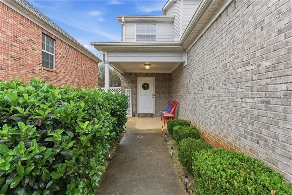 809 Winsap Drive Stockbridge, GA 30281 - Photo 5 of 41 a view of a pathway along the building