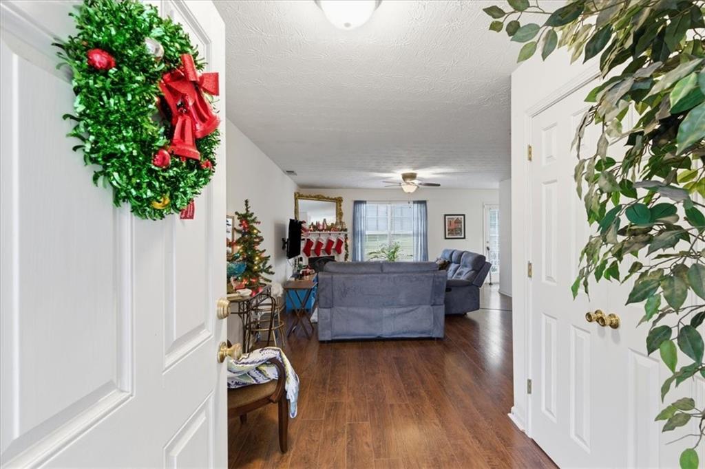 809 Winsap Drive Stockbridge, GA 30281 - Photo 6 of 41 a living room with furniture and a potted plant