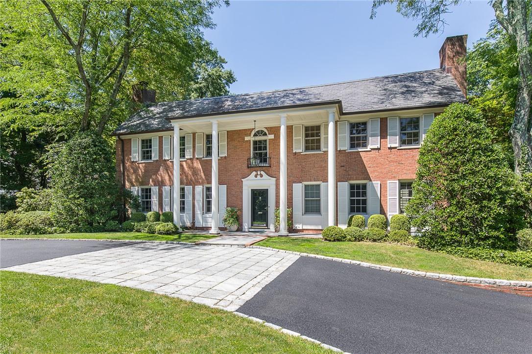 89 Morris Lane Scarsdale, NY 10583 - Photo 1 of 1 a front view of a house with a yard