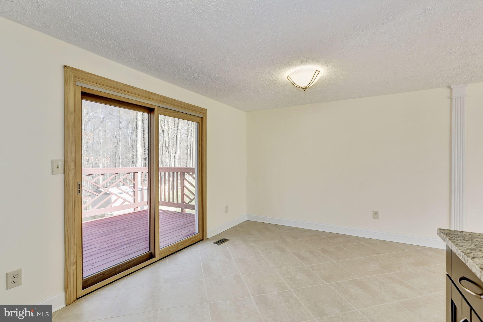 8284 Raindrop Way Springfield, VA 22153 - Photo 13 of 30 View of the Dining Room with walkout to Deck
