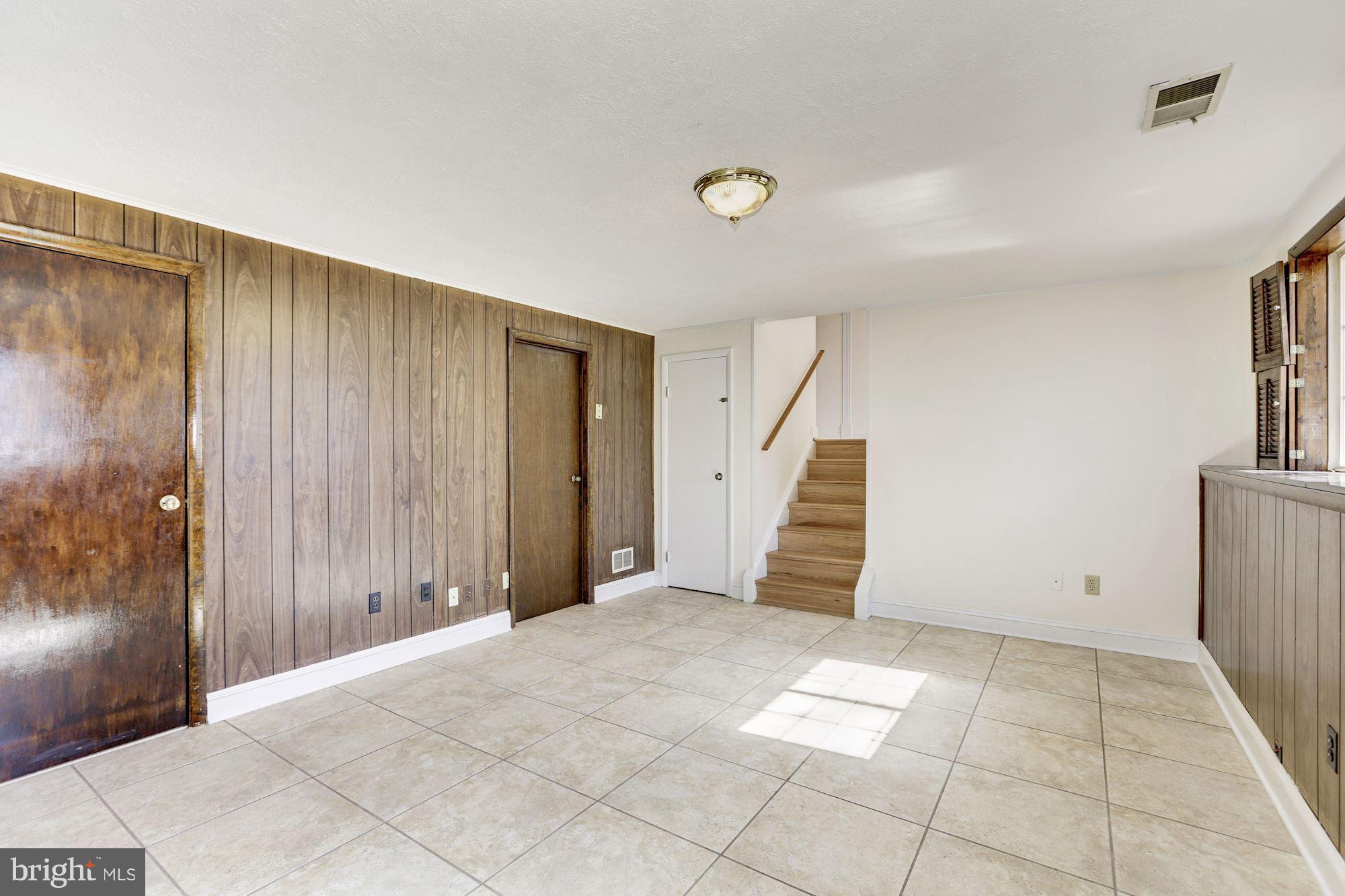 8284 Raindrop Way Springfield, VA 22153 - Photo 15 of 30 Stairs to the Family Room in the Lower Level
