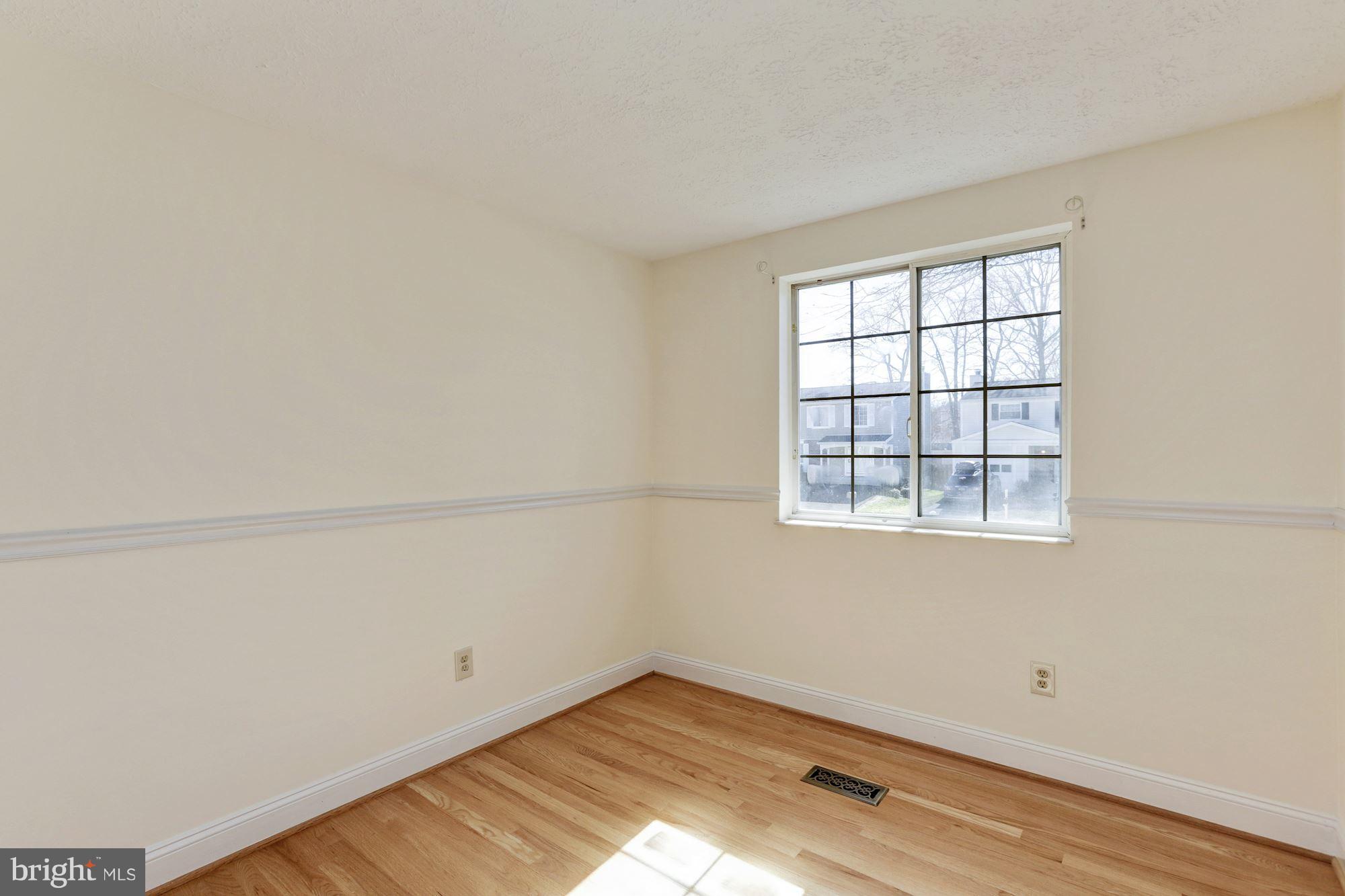 8284 Raindrop Way Springfield, VA 22153 - Photo 26 of 30 Second Bedroom faces front