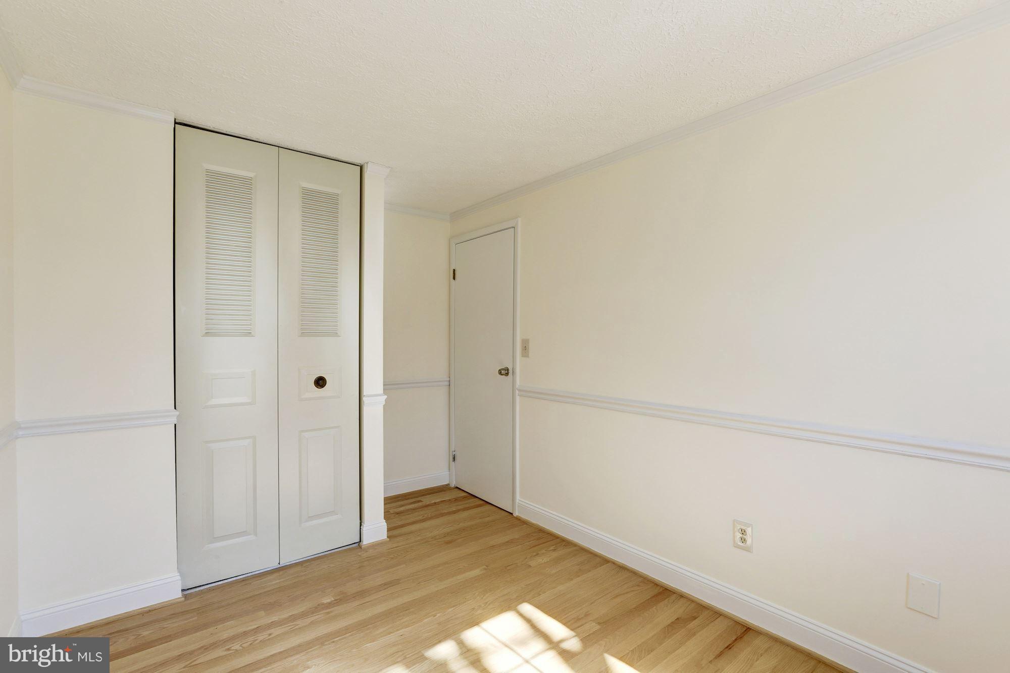 8284 Raindrop Way Springfield, VA 22153 - Photo 29 of 30 View of closet in Third Bedroom