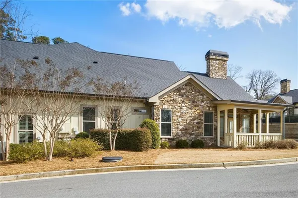 a view of a building with a street