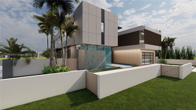 a view of a couches in the patio with a small yard