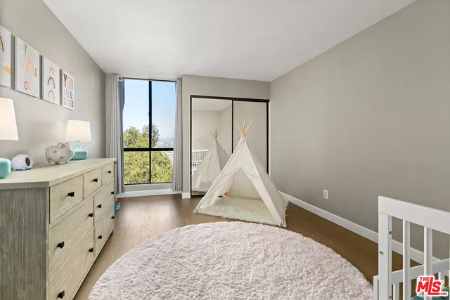 a bathroom with a shower and a toilet