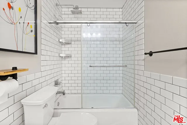 a view of a balcony and trees