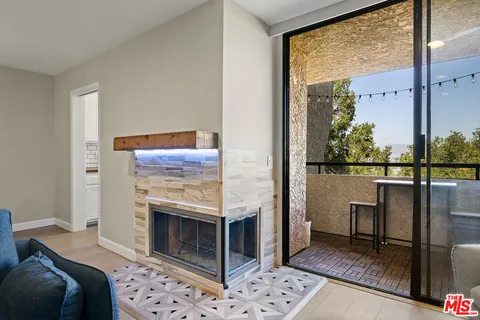 a living room with a fireplace