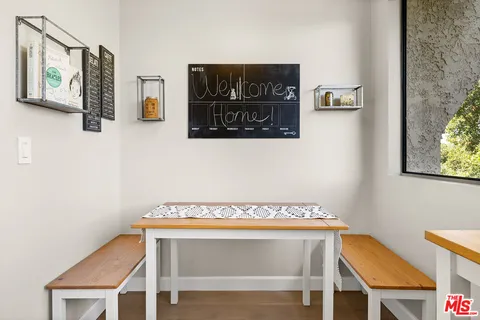 a kitchen that has a sink and a stove in it