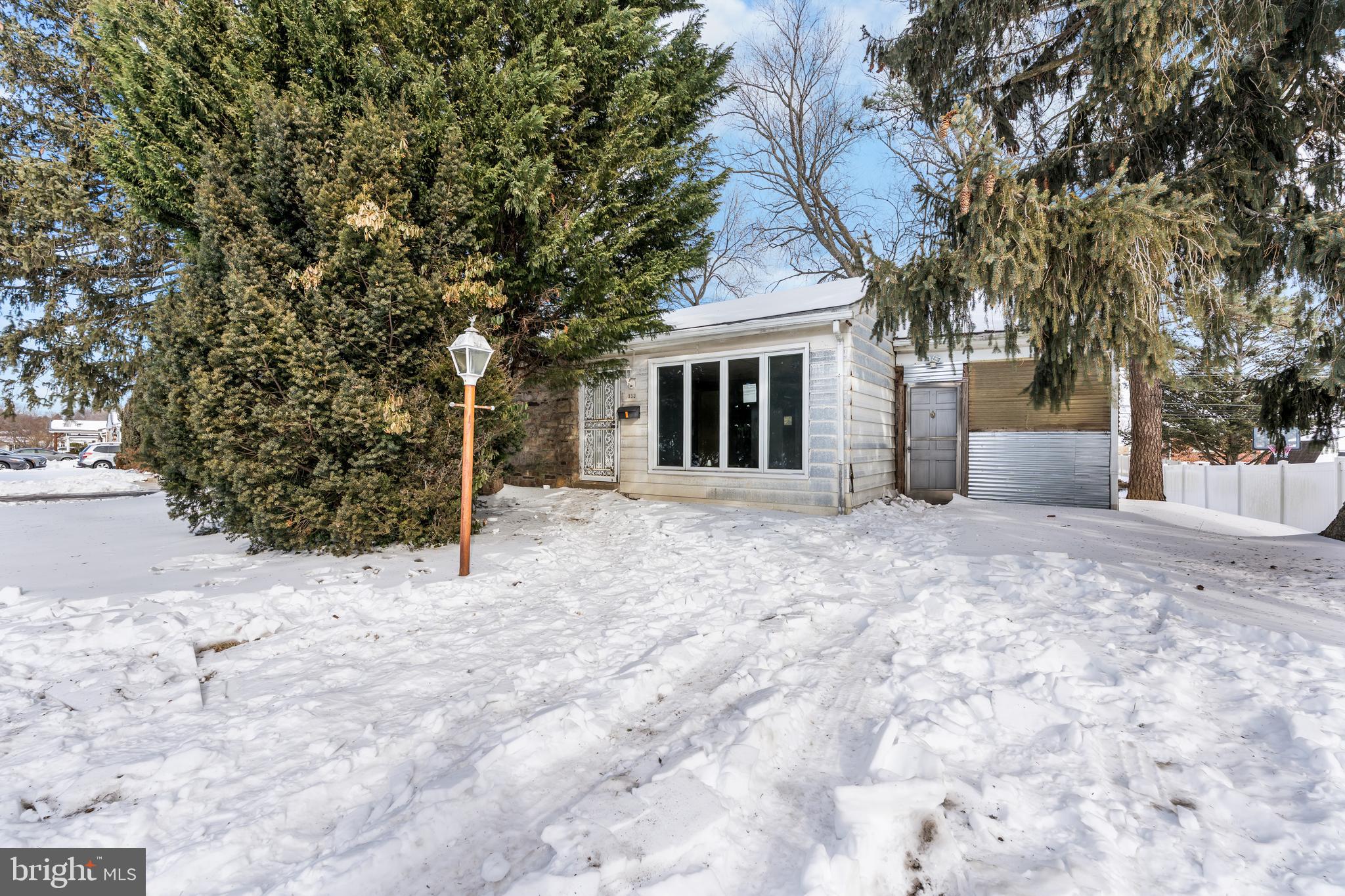 112 Butt Lane Aston, PA 19014 - Photo 22 of 24 a backyard of a house with large trees