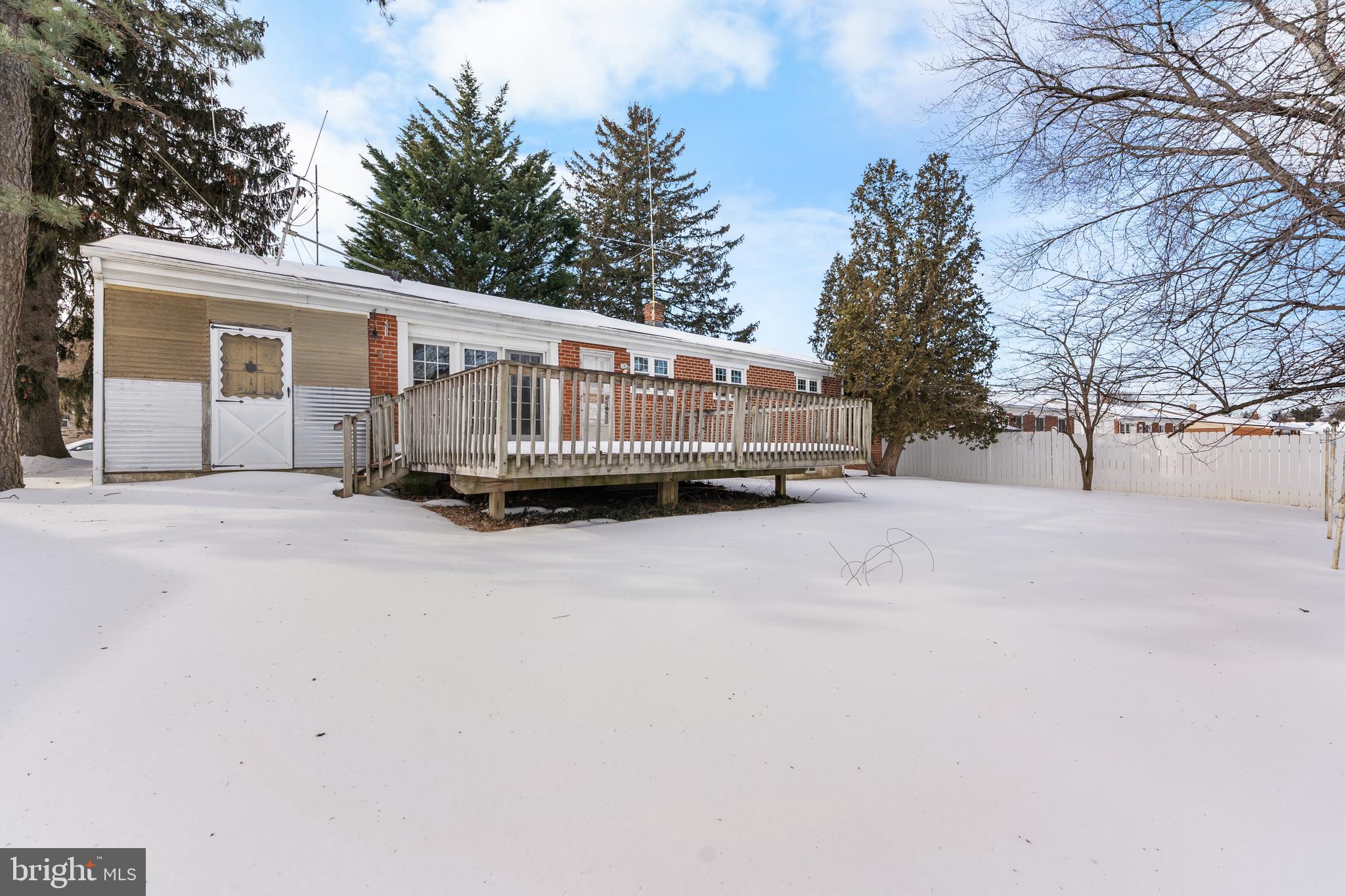 112 Butt Lane Aston, PA 19014 - Photo 24 of 24 a view of a house with a yard covered in snow