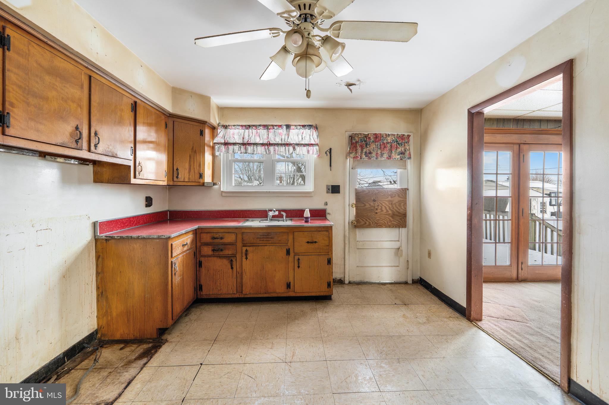 112 Butt Lane Aston, PA 19014 - Photo 9 of 24 a utility room with cabinets dryer and washer