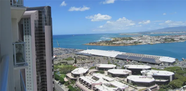 a view of city with ocean
