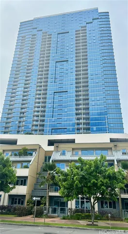 a view of a room with furniture and chandelier