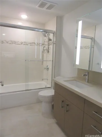 a bedroom with a bed tv and outdoor view