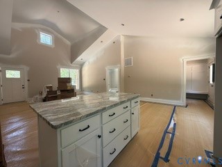 14502 Gatewood Road Dewitt, VA 23840 - Photo 10 of 32 a bathroom with a granite countertop sink and a mirror