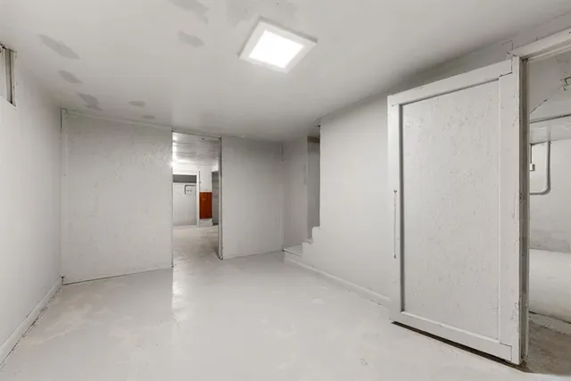 a view of a house with a snow in the yard