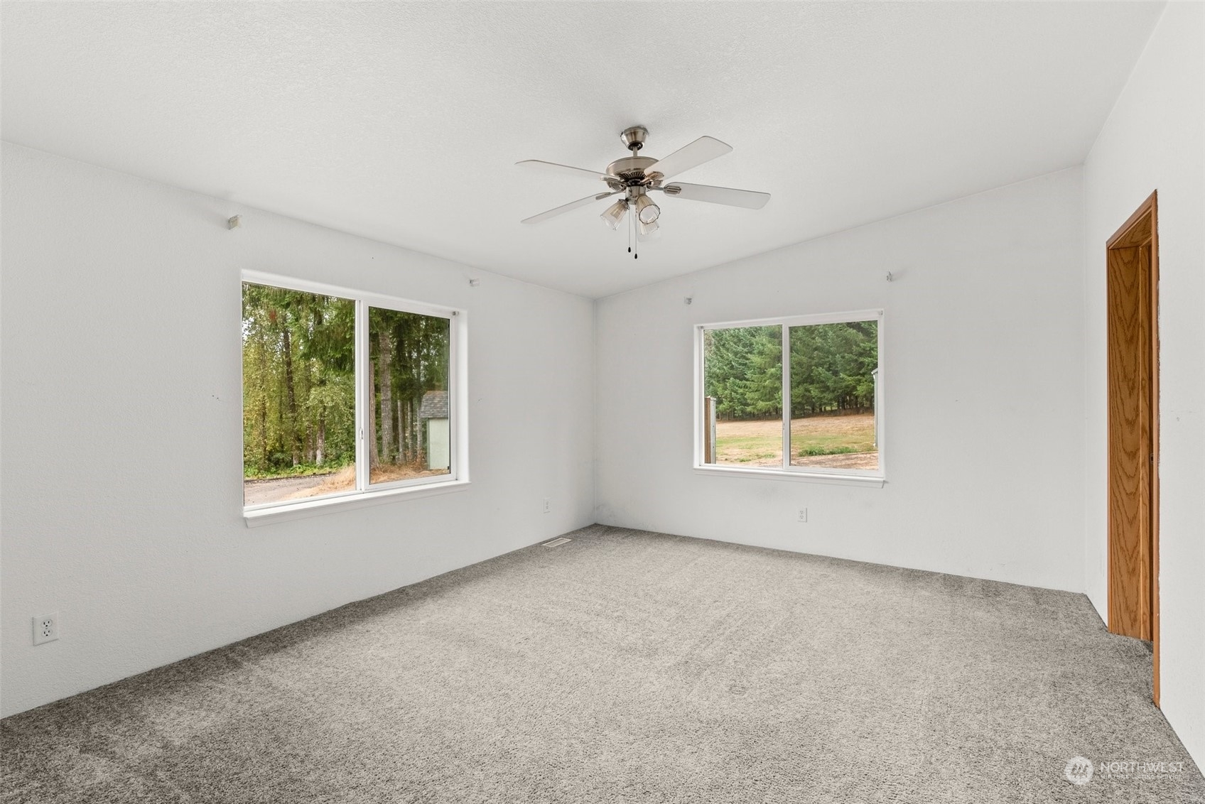 144 Aumick Road Winlock, WA 98596 - Photo 12 of 35 a view of an empty room with a window