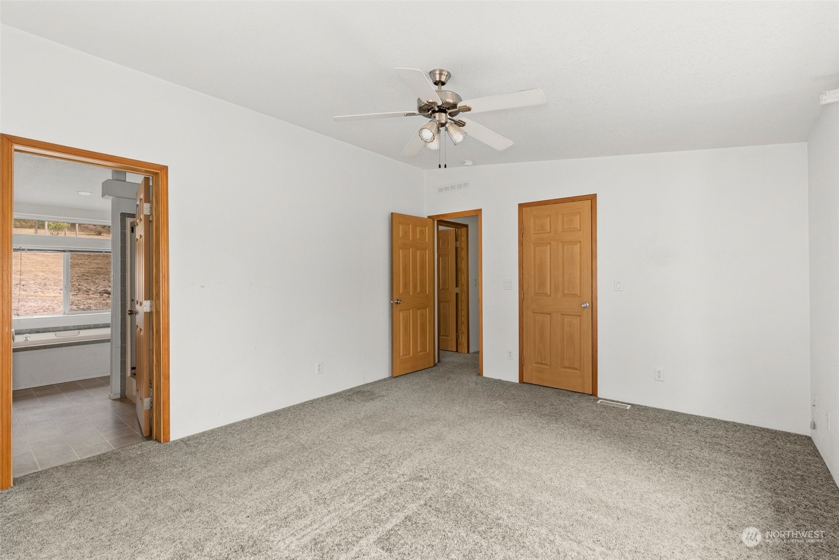 144 Aumick Road Winlock, WA 98596 - Photo 13 of 35 a view of an empty room with a window