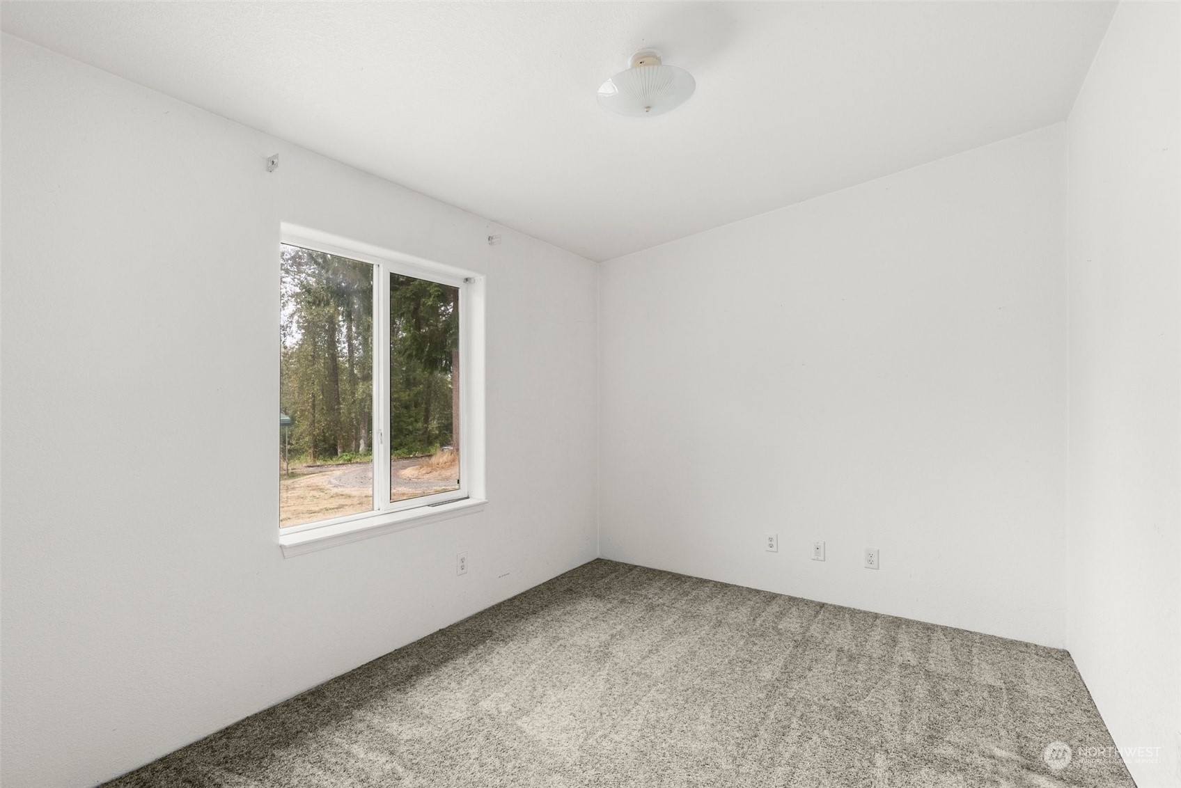 144 Aumick Road Winlock, WA 98596 - Photo 15 of 35 an empty room with a window
